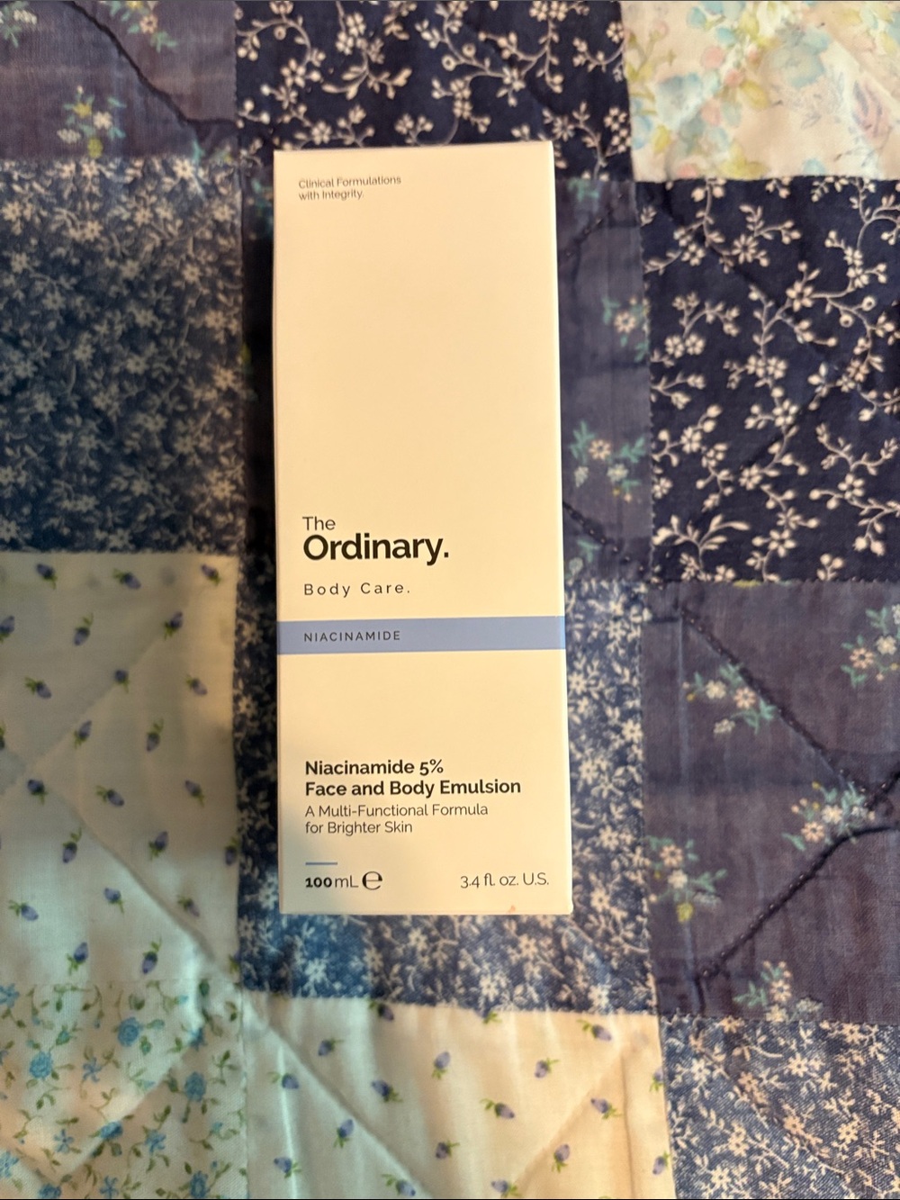 The Ordinary Niacinamide Face & Body Emulsion – White and Light Blue Packaging